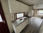 Casa Móvel "Chalet Wood Gray" 10,8 x 3,7m – Design Moderno com Bow Window e Entrada Dupla - Image 14