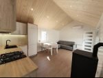Casa Móvel "Reale II" 12x4m – Telhado a 30° com Salamandra a Pellets e Teto em Madeira (3 Quartos) - Image 13